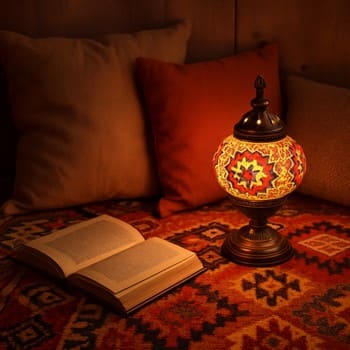 Okuma köşesinde plaid, yastık ve masa lambasıyla hazırlanmış set